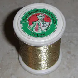 Gudebrod Champion "Gerechtvaardigd Pure kleurstof" metalen draad grootte D (1 oz spoelen)